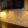 1 x 1  travertine full backsplash.