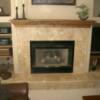 Elegant 12x12 travertine fireplace with chair rails