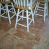 16x16 porcelain tile straight lay with L-shape 3x6 porcelain tile inset under bar stools