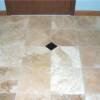 12x12 travertine tile with black granite inset